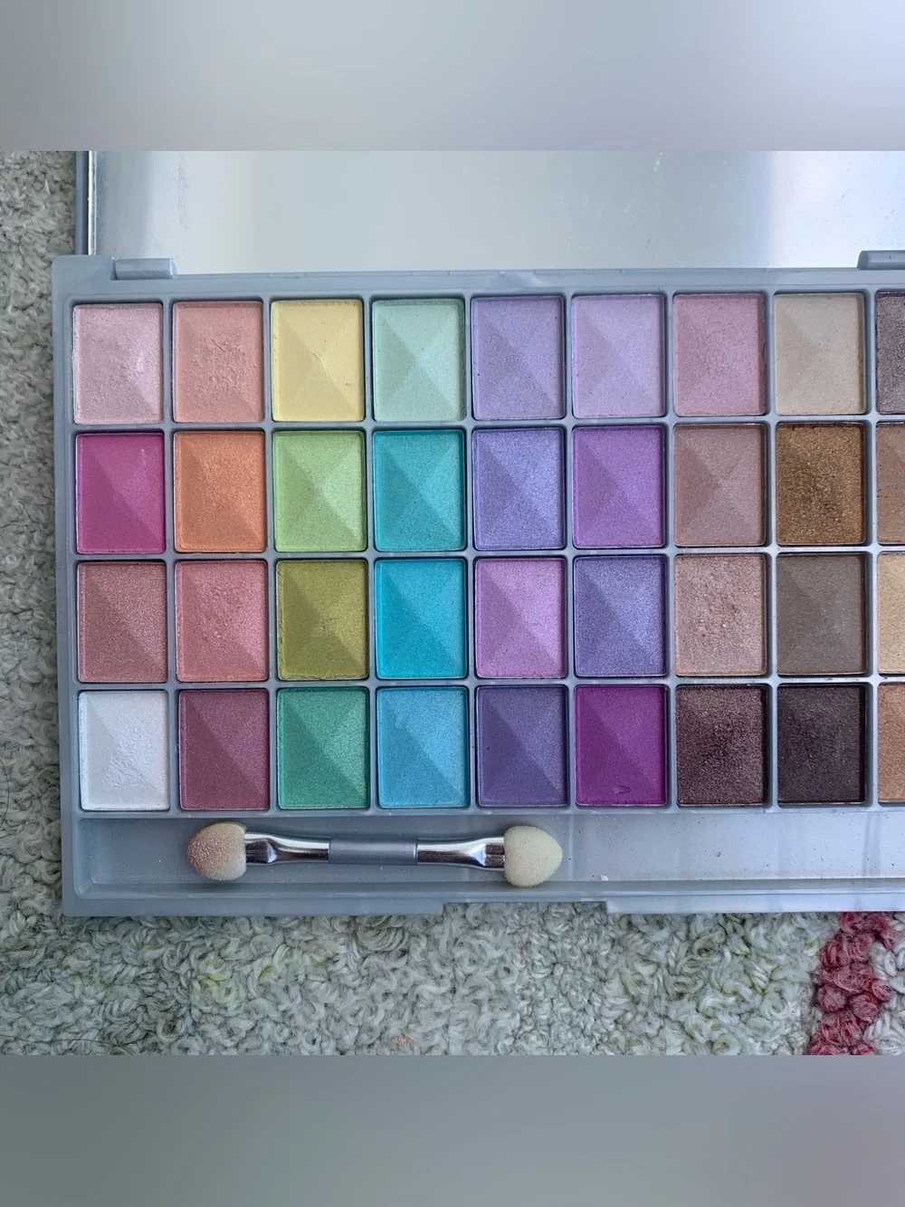 Claire's multi-colored eyeshadow palette with 24 shades
